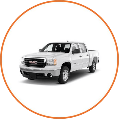 White GMC Sierra crew cab inside an orange circular frame.