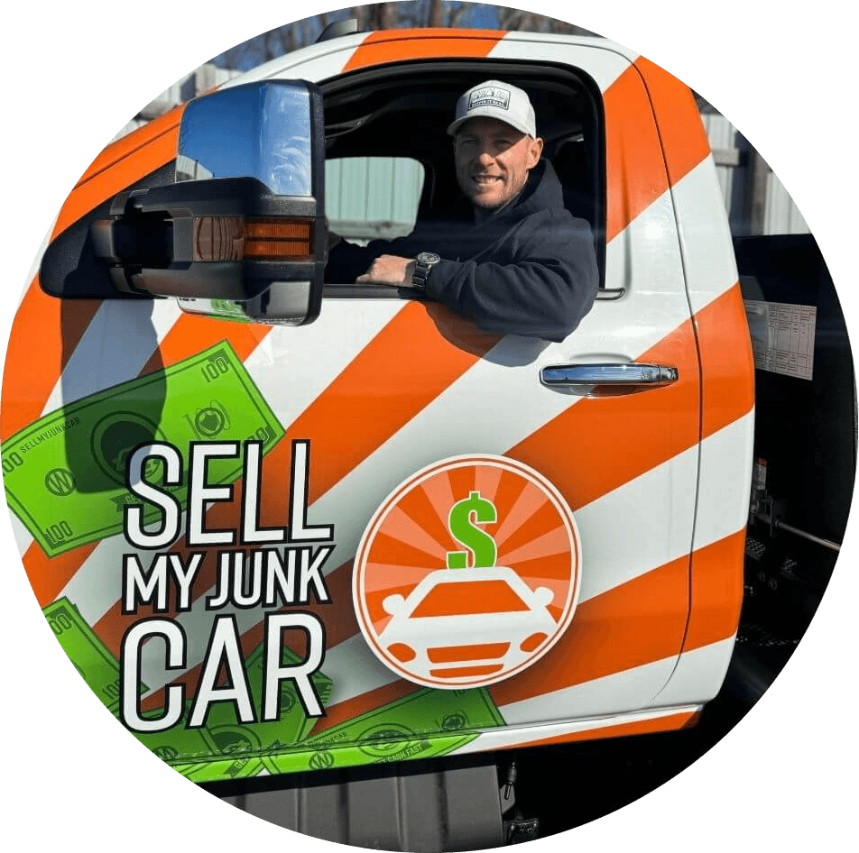 Tyler inside the Sell My Junk Car Tow Truck